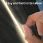 Hand installing a strip of LED light inside a vehicle.
