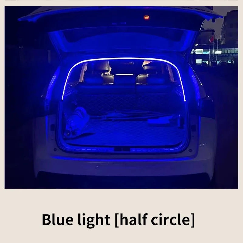 Car trunk with blue light half-circle illumination